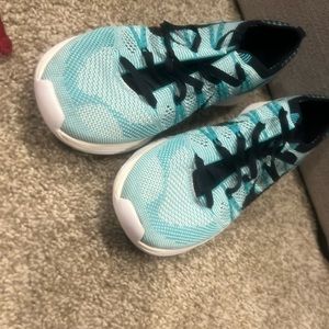 Brand new Nike flyknit one size 8 teal /black/white